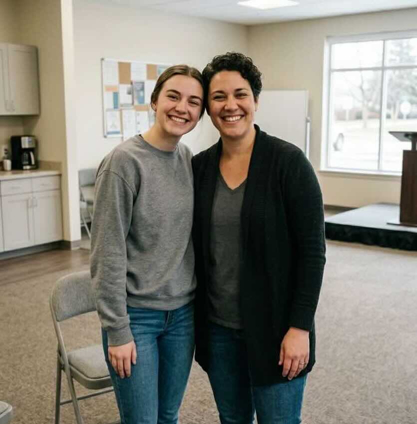 Two people talking at an AA meeting in Richmond